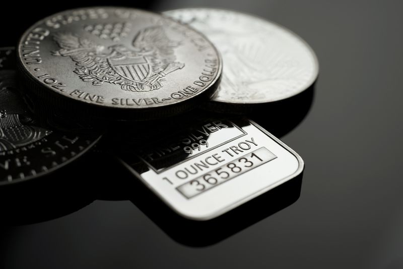 Silver coins and bar